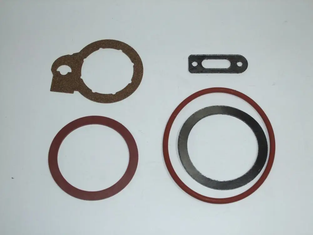 Dichtungen und Ringe in verschiedenen Formen und Materialien, geeignet für Anwendungen mit Daikin Produkten, angeordnet auf einem weißen Hintergrund.